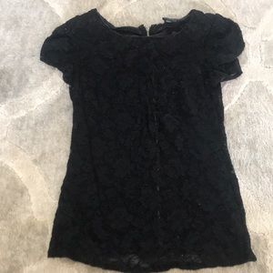 See thru Lacey/flowered blouse.